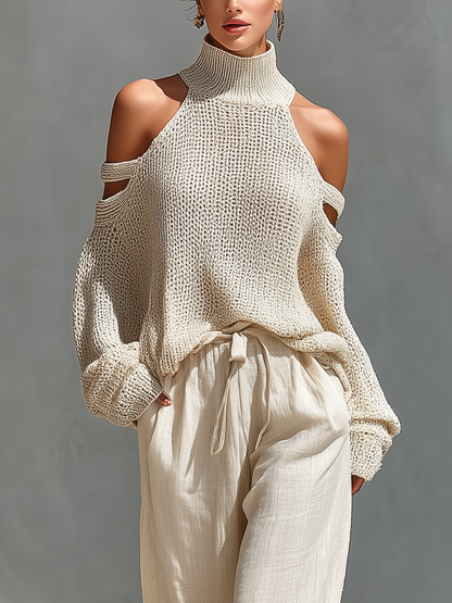 Top collo alto con spalle scoperte in maglia beige per donne e pantaloni a gamba larga