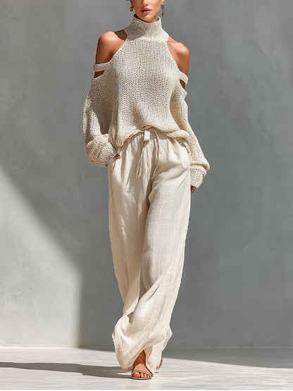 Top collo alto con spalle scoperte in maglia beige per donne e pantaloni a gamba larga