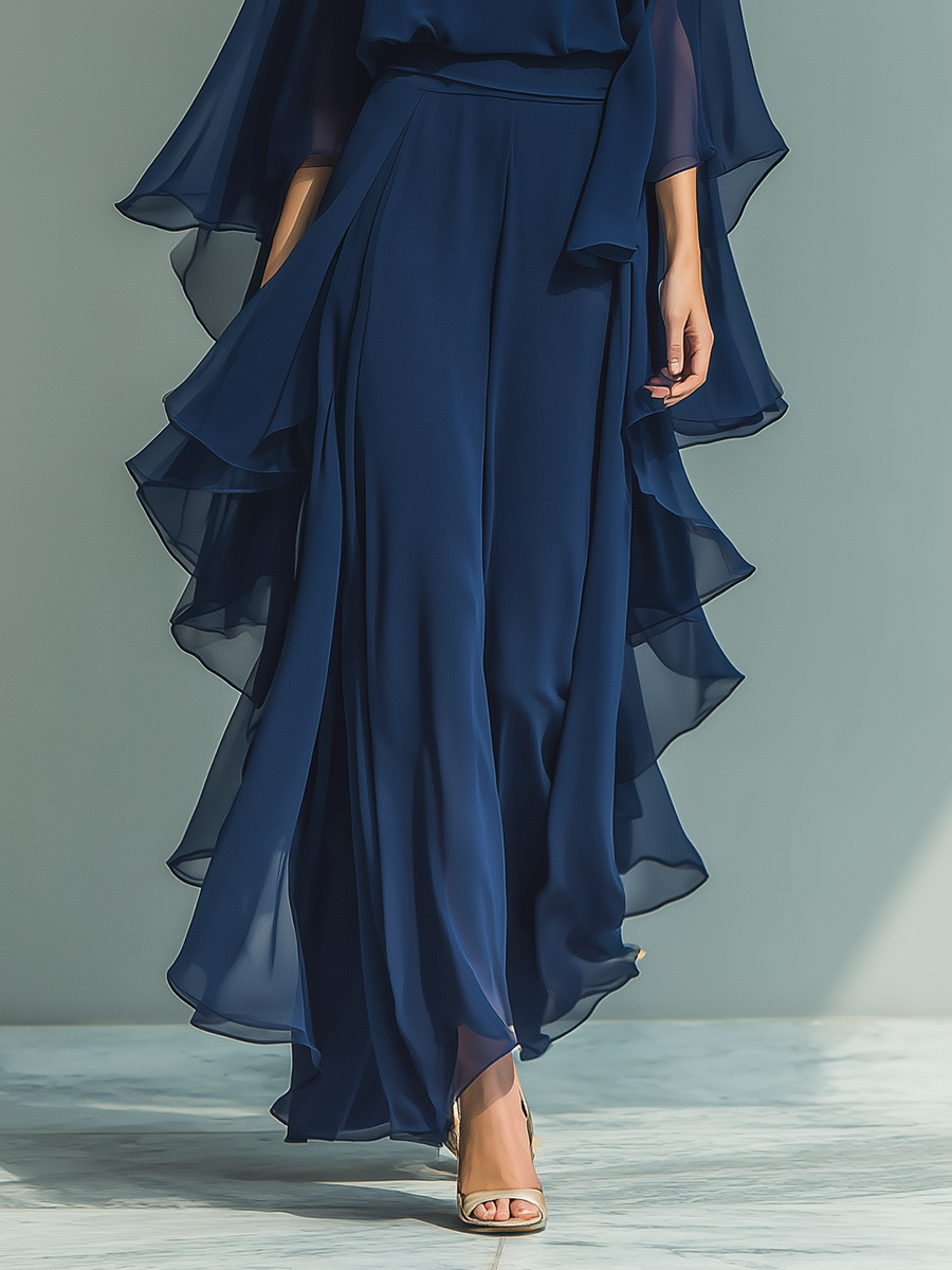 Completo da donna top in chiffon blu scuro con maniche a campana e pantaloni dritti con dettagli a balze