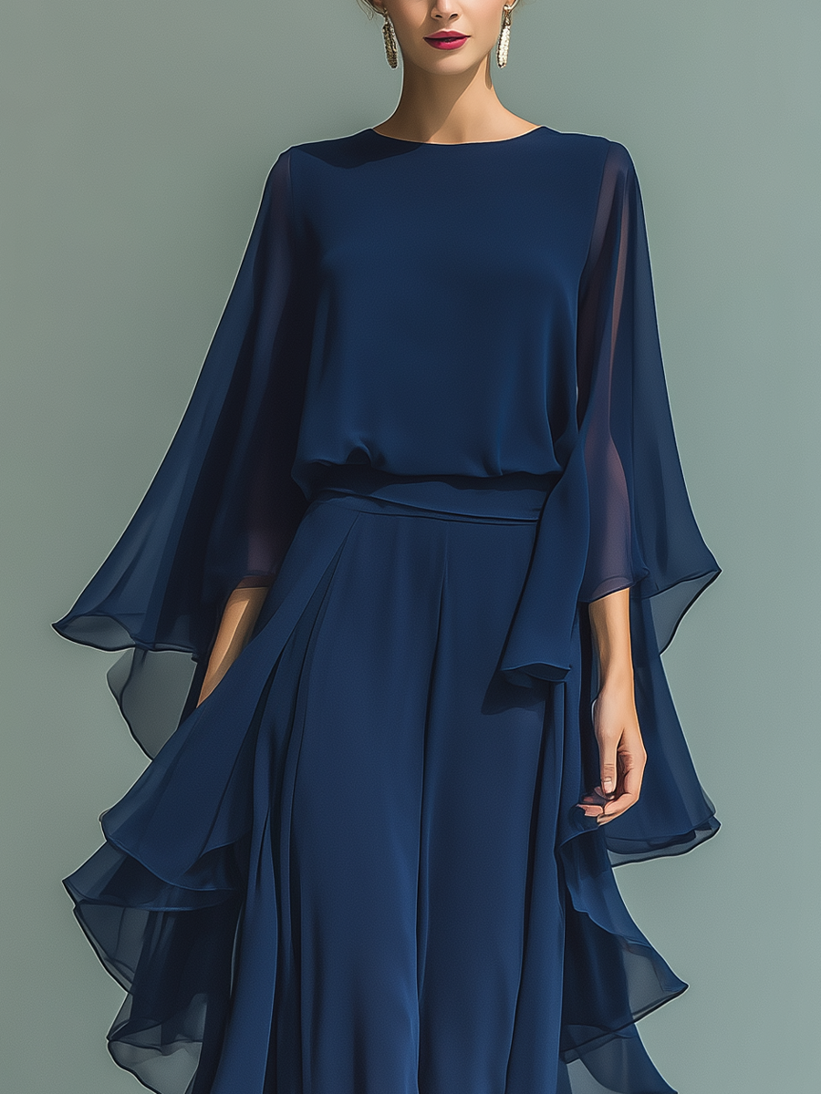 Completo da donna top in chiffon blu scuro con maniche a campana e pantaloni dritti con dettagli a balze