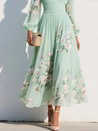 Abito lungo plissettato in chiffon verde menta con stampa floreale da donna