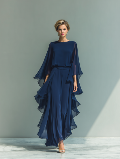 Completo da donna top in chiffon blu scuro con maniche a campana e pantaloni dritti con dettagli a balze