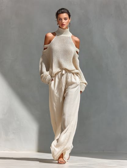 Top collo alto con spalle scoperte in maglia beige per donne e pantaloni a gamba larga